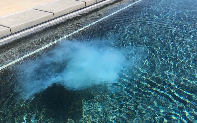 PR-10,000 phosphate remover cloud in a swimming pool, from the red cap test