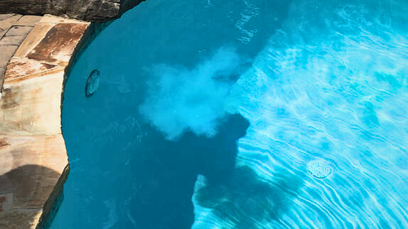 PR-10,000 red cap test, small cloud showing phosphates are present in the pool - Edited